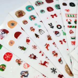 Autocollants d'ongles de Noël pour enfants renne de dessin animé flocon de neige détail.
