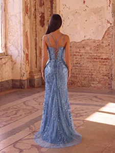 Detail view of the stunning blue sequin evening dress featuring lace-up back design.