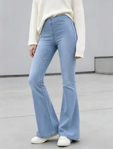 Detail view of women's light blue high waist elastic denim flare pants, stylish casual wear.