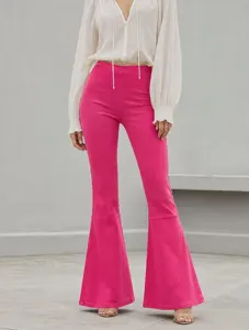 Detailed view of women's hot pink stretchy denim flare pants, perfect fit and stylish look.