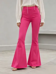 Hot pink high-waisted flare pants for women, slim fit bell-bottom trousers detail view.