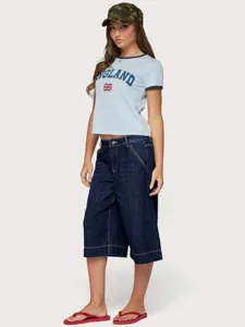 Low waist loose straight washed denim capris paired with a casual ringer t-shirt for women.