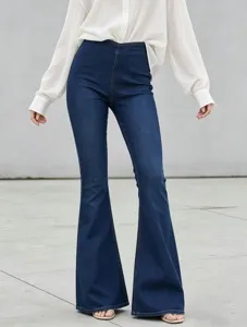 Detailed view of the dark blue high-waisted denim flare pants, showing slim fit and stretchy fabric.
