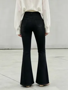 Back view detail of women's black high waist denim flare pants, stretchy slim fit casual jeans.