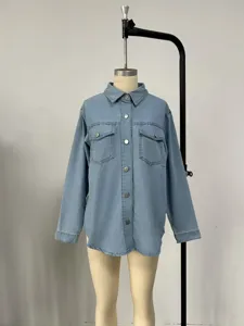 Detailed view of the casual denim jacket showcasing classic lapel, metal buttons and chest pockets.
