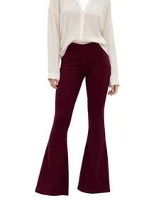 Details of women's elastic stretch flare trousers in burgundy, slim fit casual long pants style.