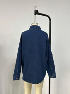 Back view detail of casual denim long-sleeve jacket, showing classic wash and clean cut.