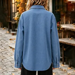 Back view of a casual women's denim long-sleeve shirt jacket with lapel and buttons.