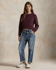Wine red knit sweater detail, cozy textured fabric, stylish European autumn fashion look.