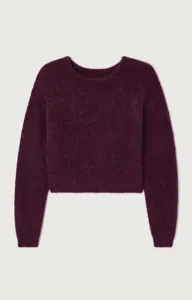 Burgundy fuzzy knit sweater detail, soft mohair texture, cozy round neck winter apparel.