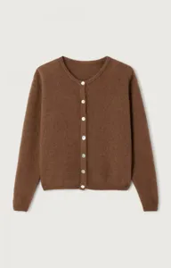 Close-up of brown knit cardigan featuring white pearl buttons and soft wool texture.
