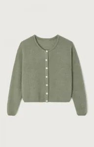 Detailed view of women's knitted cardigan, button-up design, soft fabric for daily wear.