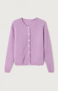 Detailed view of women's knit cardigan showing soft fabric texture and button details.