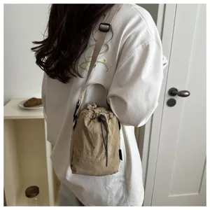 Borsa a secchiello a tracolla monocolore minimalista da donna, elegante borsa casual.