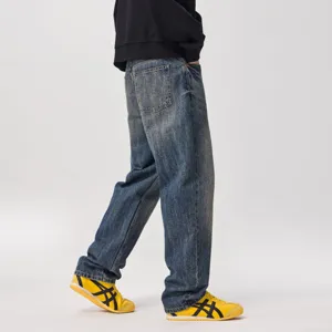 Jeans in denim vintage slavato ampio da uomo, stile streetwear americano, pantaloni casual.