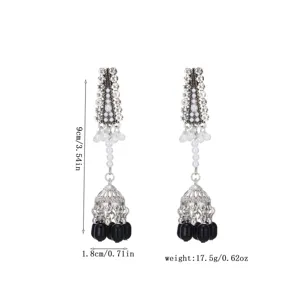Vintage silver rhinestone jhumka long earrings with black and white pearl tassel detail.