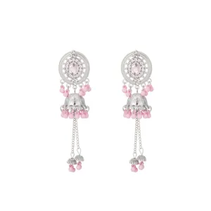 Detailed close-up of silver dangling earrings featuring pink beads and clear crystal elements.