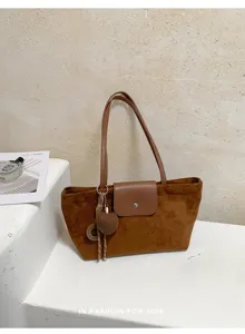 Vintage suede tote bag for women, large capacity shoulder bag for daily work and commuting style.