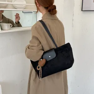 Retro black suede tote bag for women, large capacity commuter shoulder bag with flap.