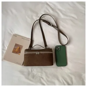 Bolso estilo caja marrón retro de patchwork con asa y correa cruzada para mujeres.