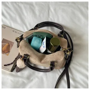Retro suede boston shoulder bag with charm, casual minimalist handbag for women daily commute.