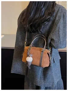 Retro brown suede Boston handbag with cute pendant, stylish Korean fashion shoulder bag.