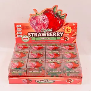 Crystal strawberry squishy toy transparent stress relief fruit toy for sensory play and fun.
