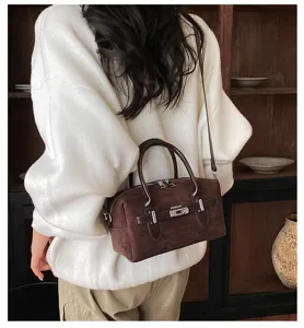 Korean style vintage suede pillow bag for women, chic commuting shoulder messenger bag.