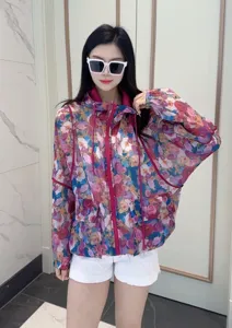 Floral print sun protection jacket detail, lightweight hooded casual outerwear for women.