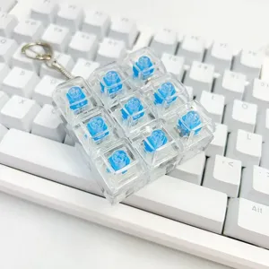 Portable mechanical keyboard switch fidget toy 3x3 clear keycap keychain detail view