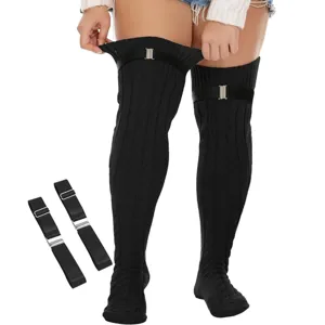 Close-up detail of black cable knit over-the-knee socks with adjustable garter straps.
