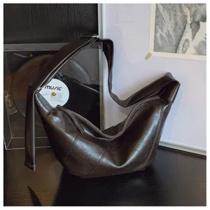 Vintage bruine zachte lederen schoudertas casual pendelen crossbody dumpling tas voor dames