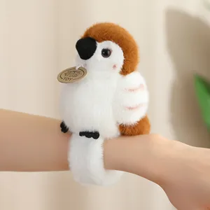 Cute fluffy plush sparrow slap bracelet soft stuffed bird wrist toy display.