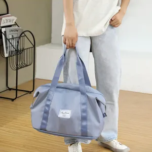 Large capacity foldable travel duffel bag fitness sports luggage bag with durable handles.