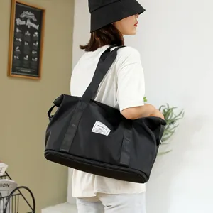 Foldable travel duffel bag large gym shoulder bag waterproof outdoor luggage storage tote.