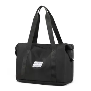 Black foldable travel gym tote bag with durable handles and spacious compartment storage design.