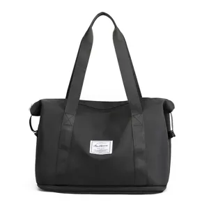 Duffle travel bag black fitness gym bag with double handles and spacious interior design.