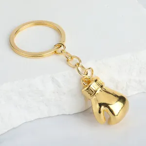 Porte-clés gant de boxe en métal doré, cadeau de fitness créatif pour les fans de sport.