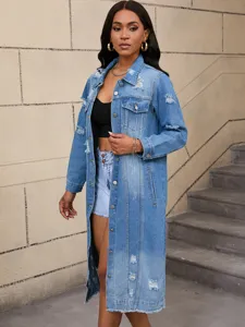 Women long distressed denim jacket trench coat detail view featuring front buttons and pockets.