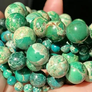 Perles rondes en jaspe impérial naturel pour la création de bijoux et de bracelets.