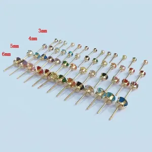 Detail view of 14K gold plated cubic zirconia 4-prong stud earrings in various sizes.