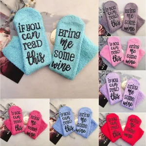 Plush fuzzy warm winter socks for women with funny letter print on sole, cozy thick crew socks.