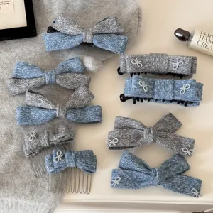Mollette per capelli con fiocco in tweed lavorato a maglia grigia fermagli e pettini eleganti donna.