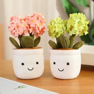 Simpatico peluche a vaso con fiori di convolvolo, pianta in morbido tessuto per decorare la casa.