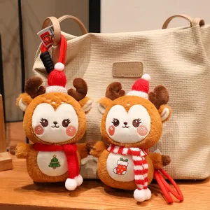 Cute Christmas reindeer plush toy keychain, soft stuffed animal backpack pendant.