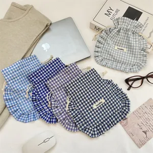 Gingham drawstring storage bag with ruffle trim, cute cloth pouch for underwear and socks.