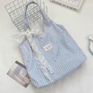 Light blue striped star canvas tote bag with elegant white lace bow for casual daily use.