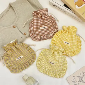 Sweet plaid ruffled drawstring storage bag, portable cloth pouch for daily sundries use.