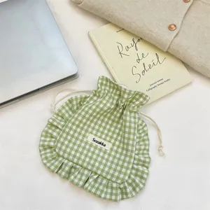 Green checkered drawstring pouch detail, fabric storage bag with cute lace ruffle trim.