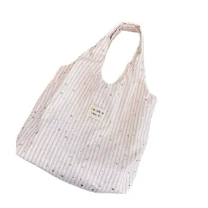 Pink striped star print canvas tote bag, casual shoulder handbag for daily storage use.